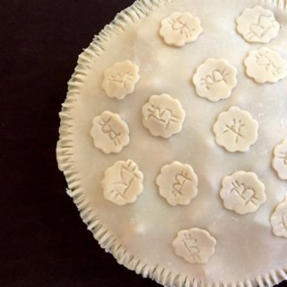 Pie dough with bitcoin decoration on top