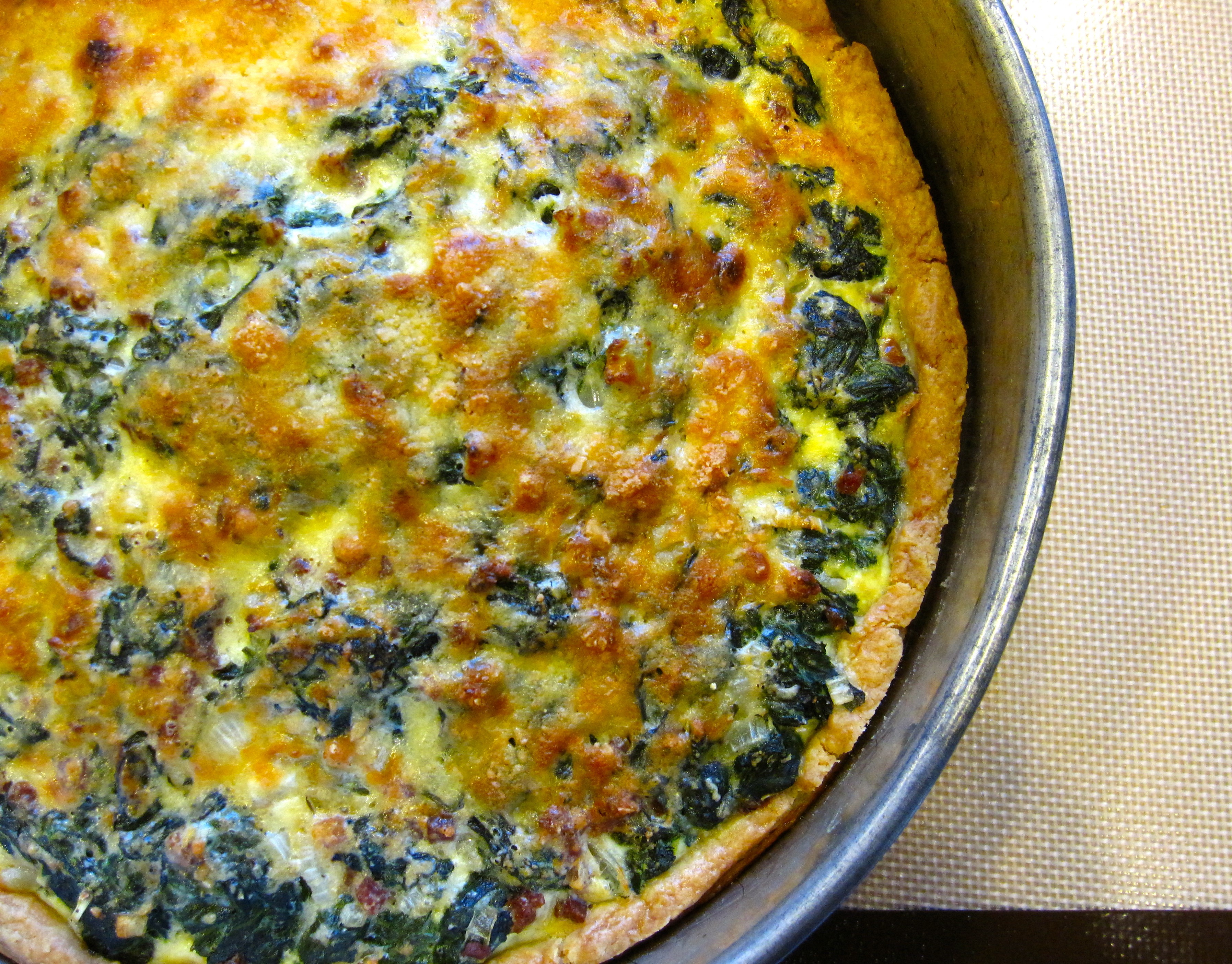 Spinach and Bacon Quiche baked and cooling.