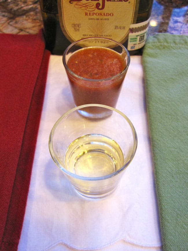 tequila and sangrita on white, green and red napkins