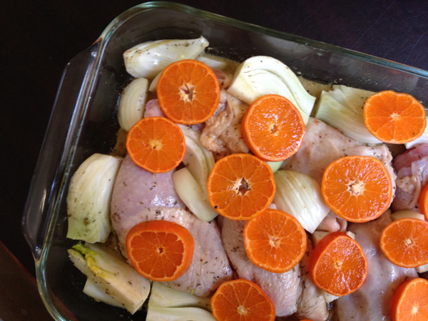 Jerusalem Roasted Chicken with Clementines in a baking dish, ready for the oven.