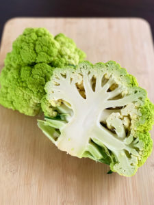 green cauliflower cut in half