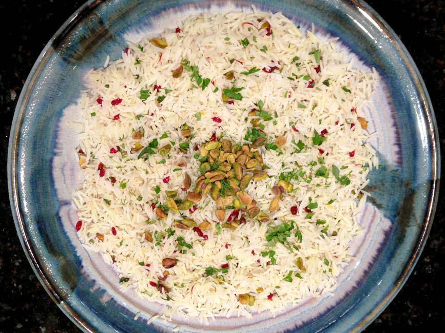 herb and barberry rice in large blue bowl