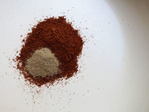 baharat and cardamom in pan for dry frying