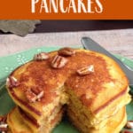 Pinterest image with stack of pumpkin spice pancakes on a green plate.