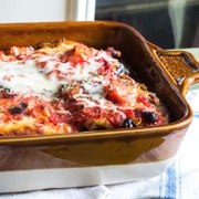 Eggplant pesto parmesan casserole just out of the oven, ready for serving.