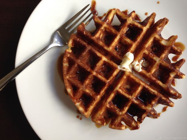 Waffles with date syrup and butter.