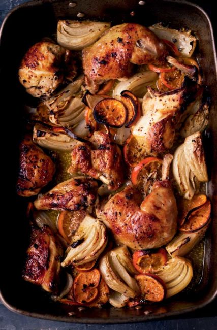 roasted chicken in pan with saffron and lemon and jerusalem artichokes