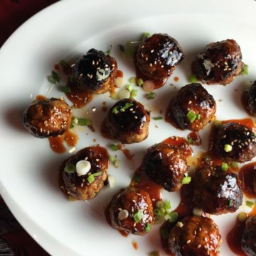 These Spicy Korean Meatballs with Gochujang Glaze work perfectly on a busy weeknight or your SuperBowl buffet. Inspired by a Foxes Love Lemons recipe on Food52