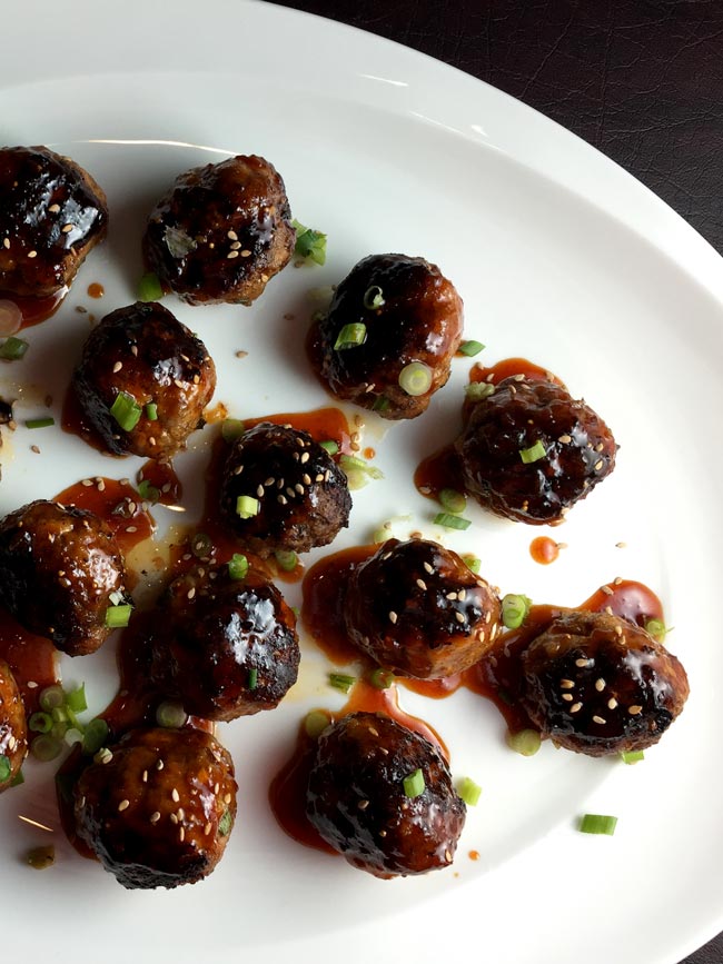 gochujang meatballs on white plate 