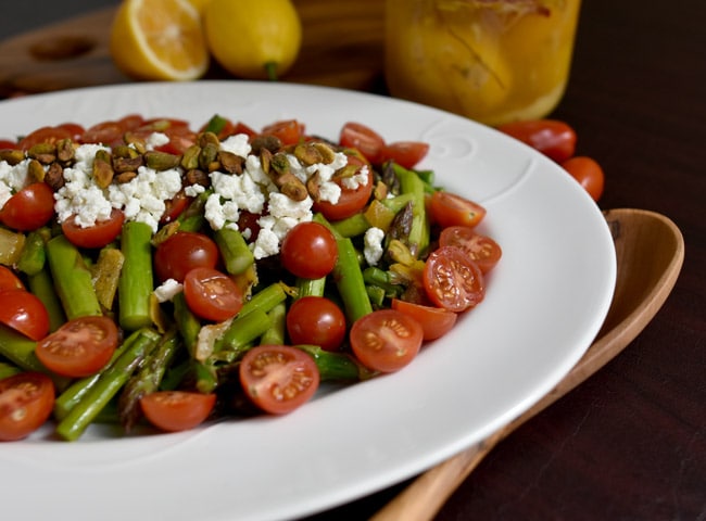 Roasted Asparagus Salad with Preserved Lemon on a white platter.