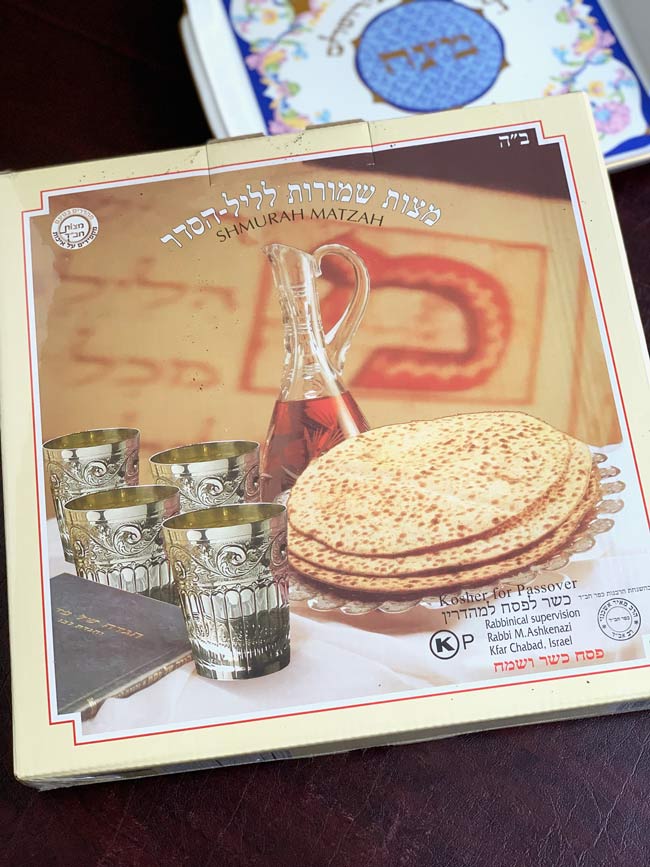 shmurah matzo box with matzo plate in the background