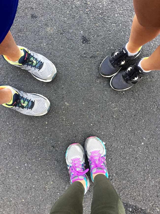 3 pairs of running shoes at turkey trot.