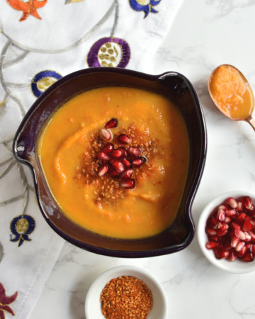 butternut squash soup with pomegranate arils and dukkah