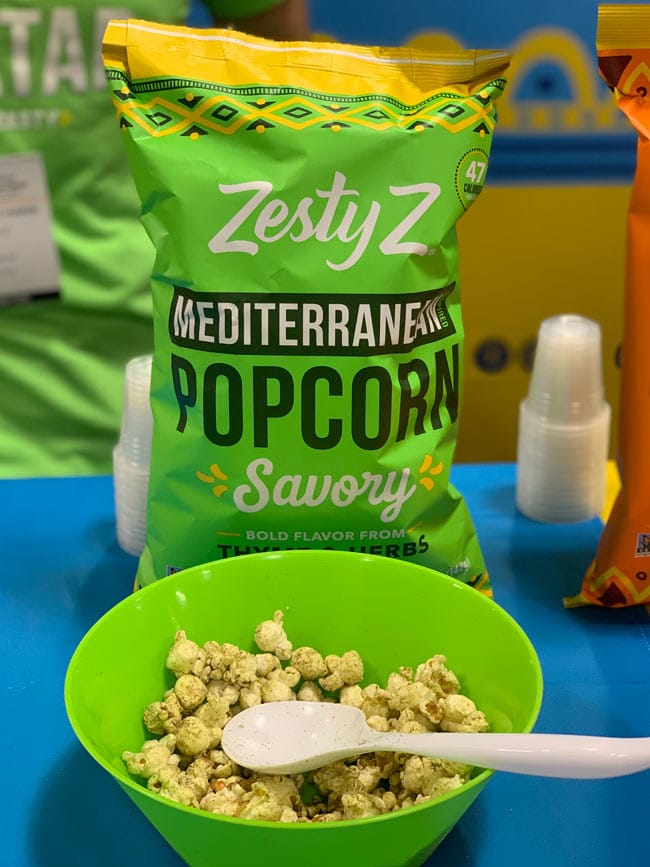 popcorn flavored with za'atar in a bright green bag and bowl