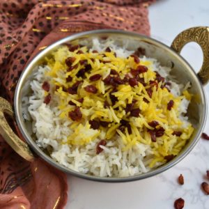index image of beauty shot of saffron barberry rice with gold-flecked scarf