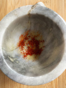 saffron smashed in mortar and pestle