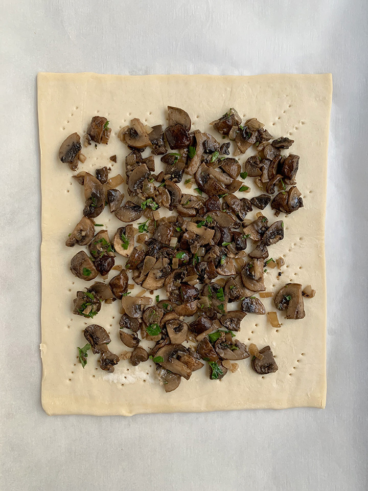 mushrooms on docked puff pastry