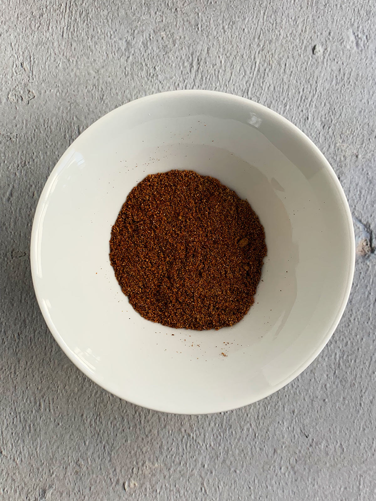 harissa spices in white bowl