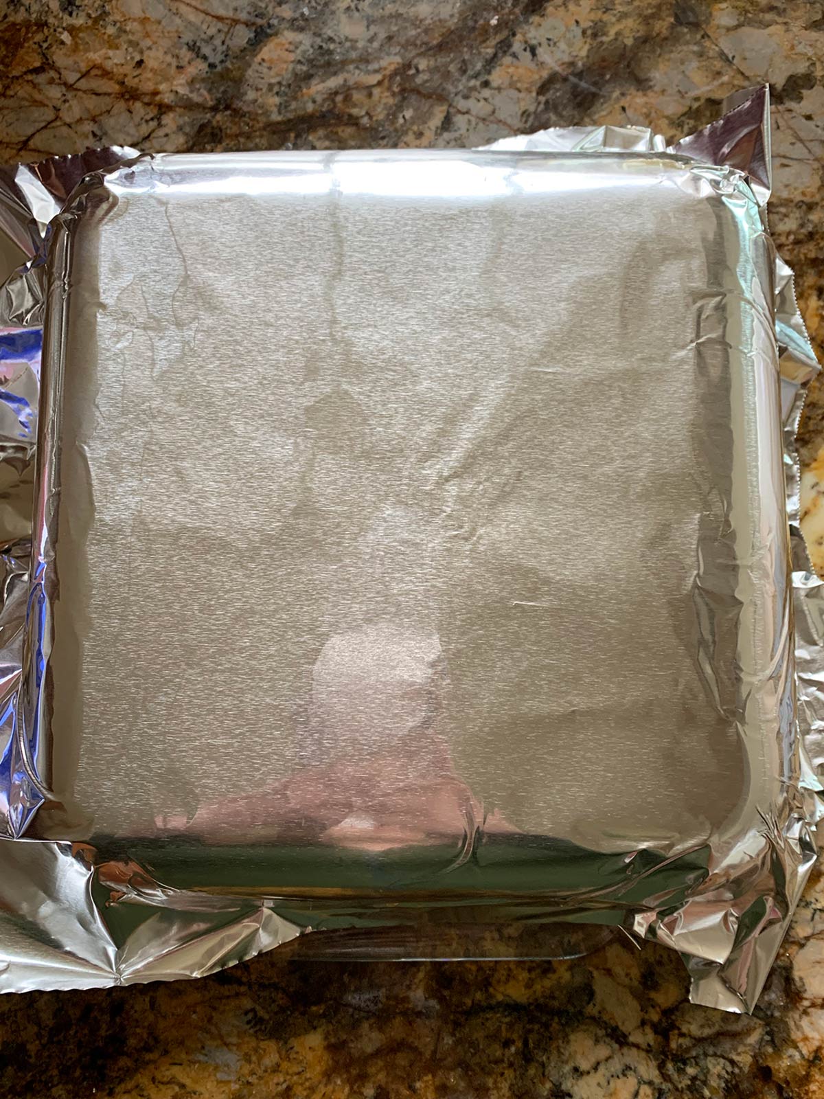 8X8 glass pan lined with tin foil.