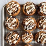 Chocolate babkas on cooling rack in a pinterest image.