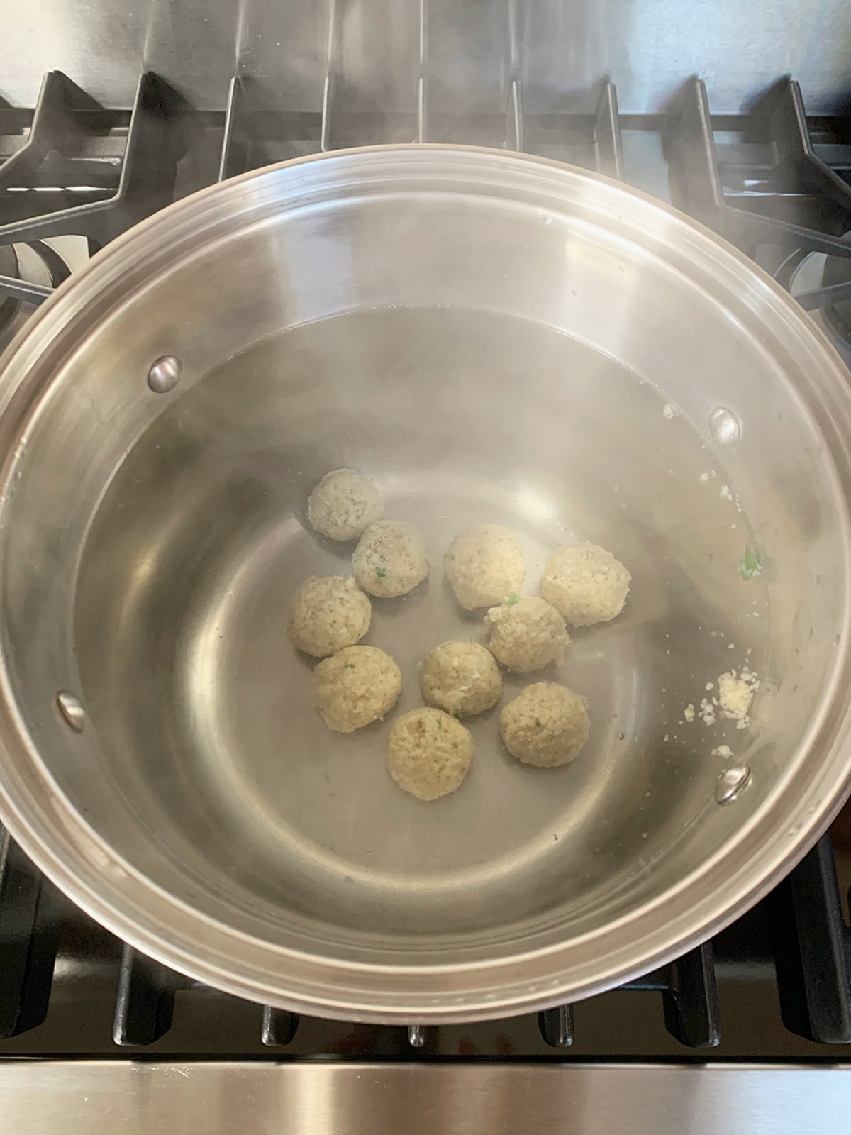 Matzo balls in pot at the bottom.