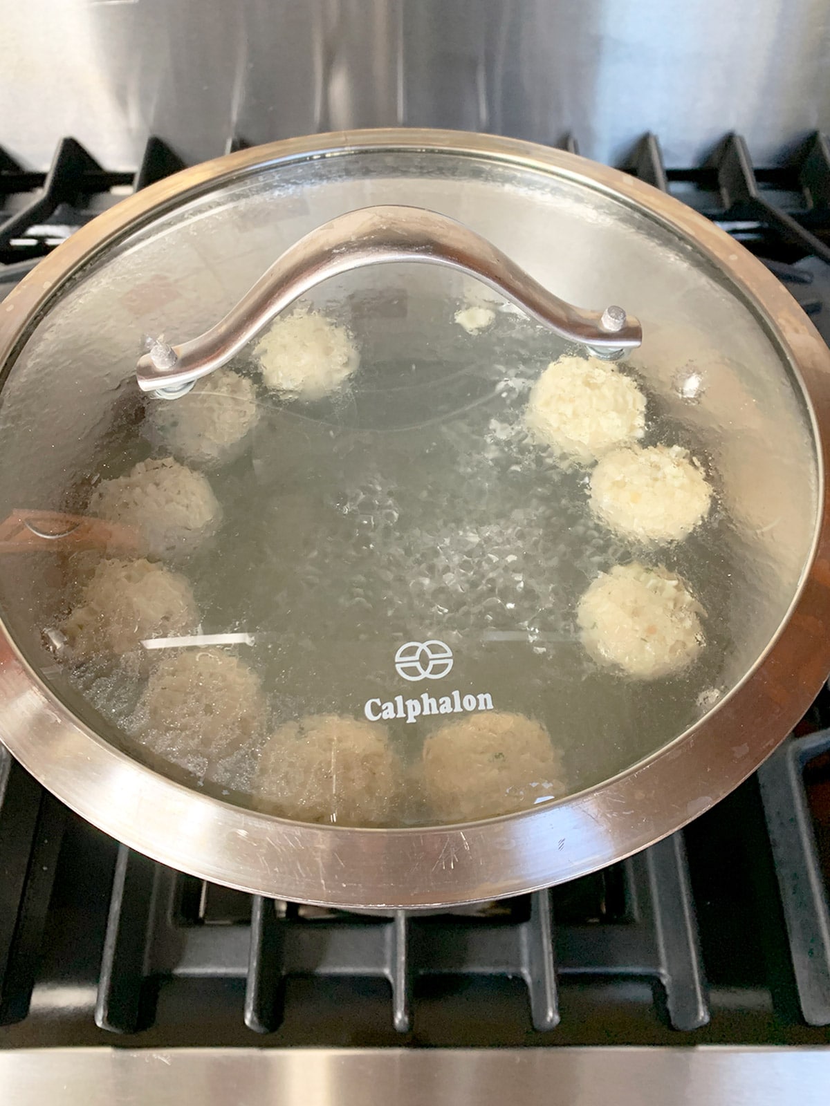 Matzo balls in pot after rising to the top.