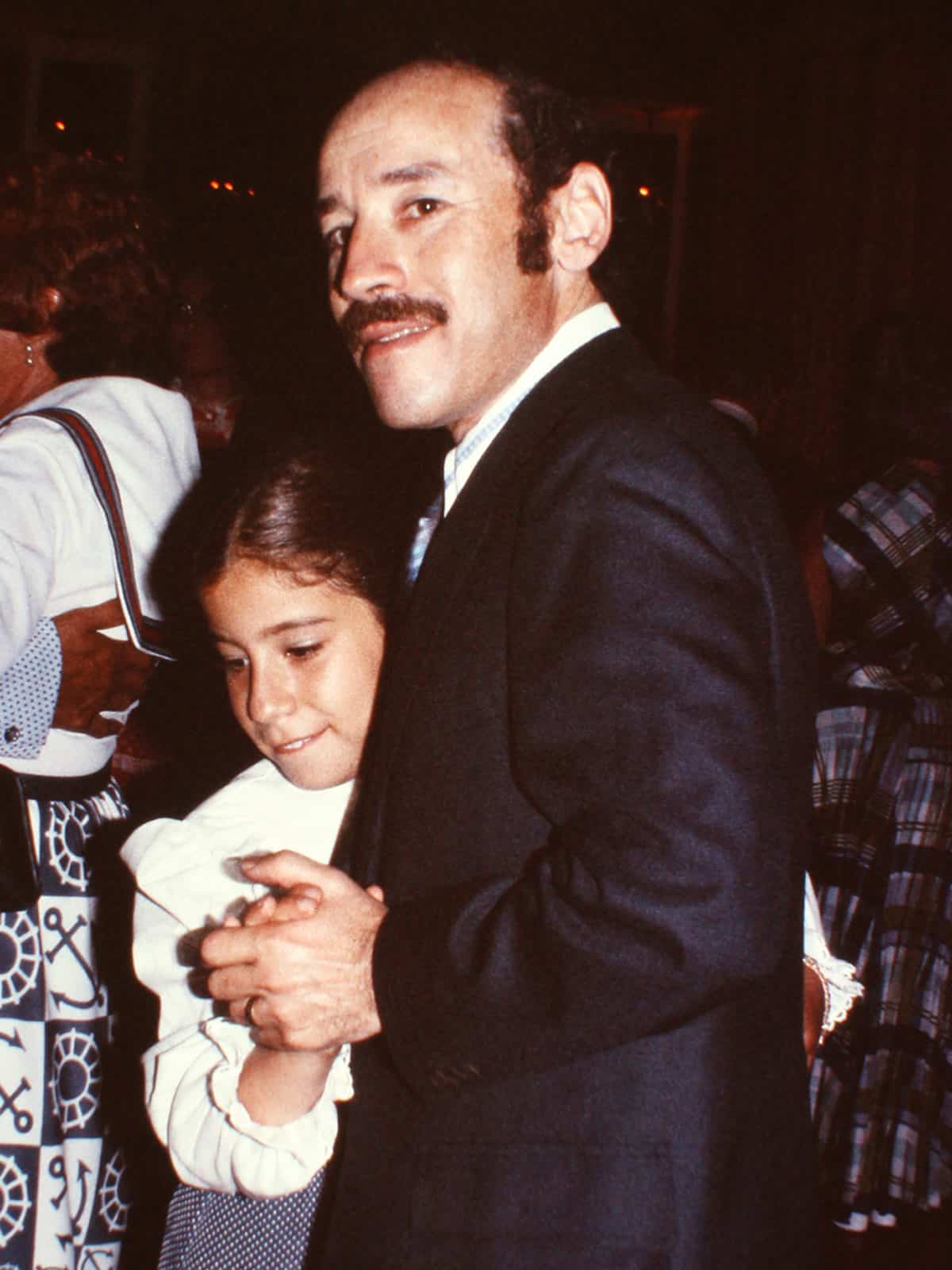 Beth Lee and her dad dancing at a celebration when Beth was a young girl.
