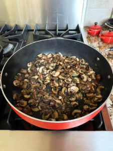 Mushrooms fully cooked for vegetarian challah stuffing and still in the pan.