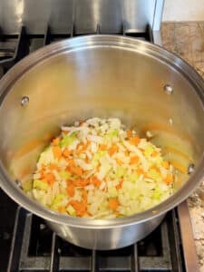 Celery, carrots and onion sauteing in the stock pot.