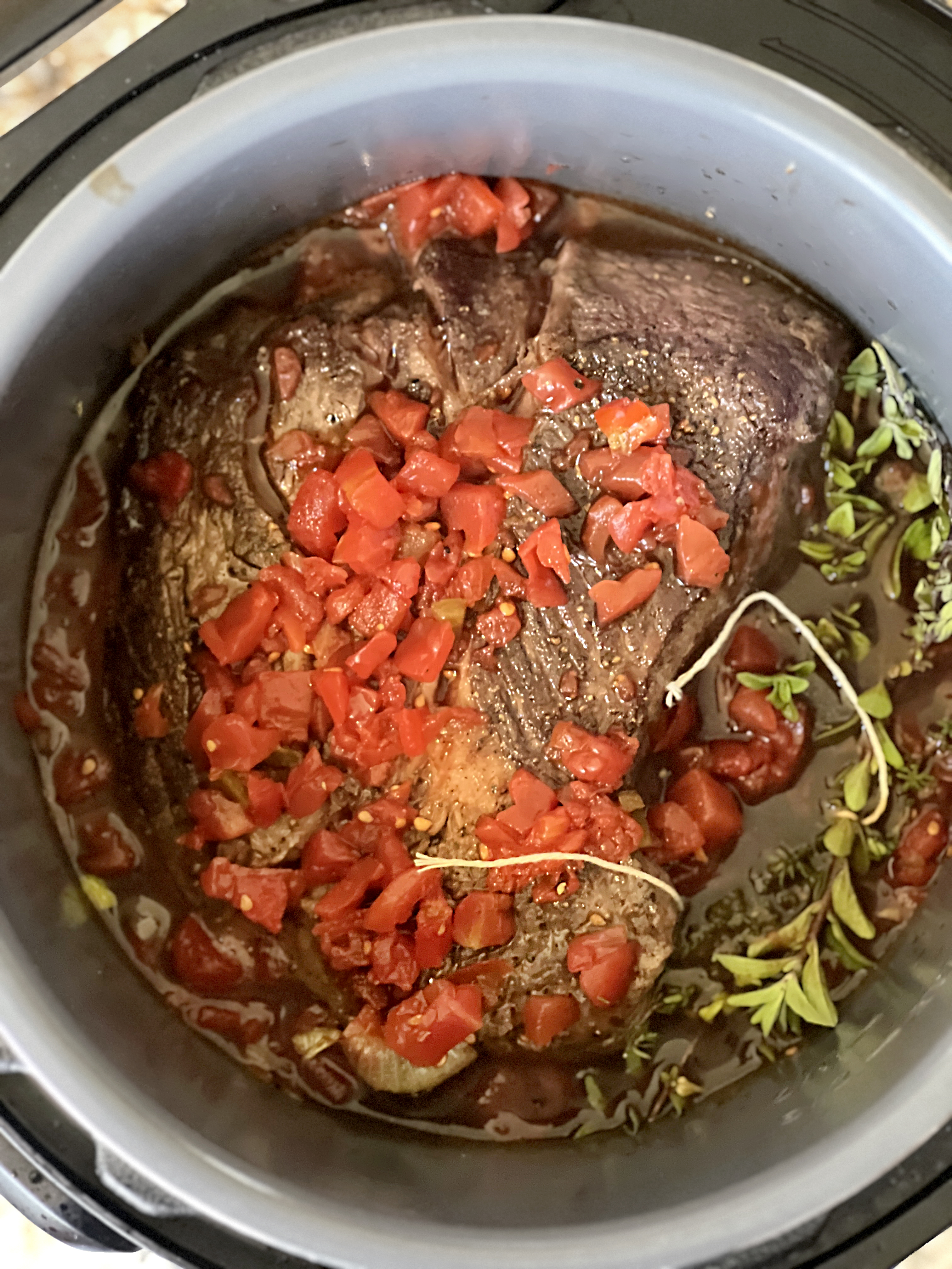 Top down view of pomegranate molasses brisket in the Instant Pot.