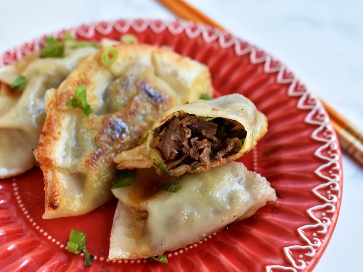 Inside of a korean beef dumpling close up view.